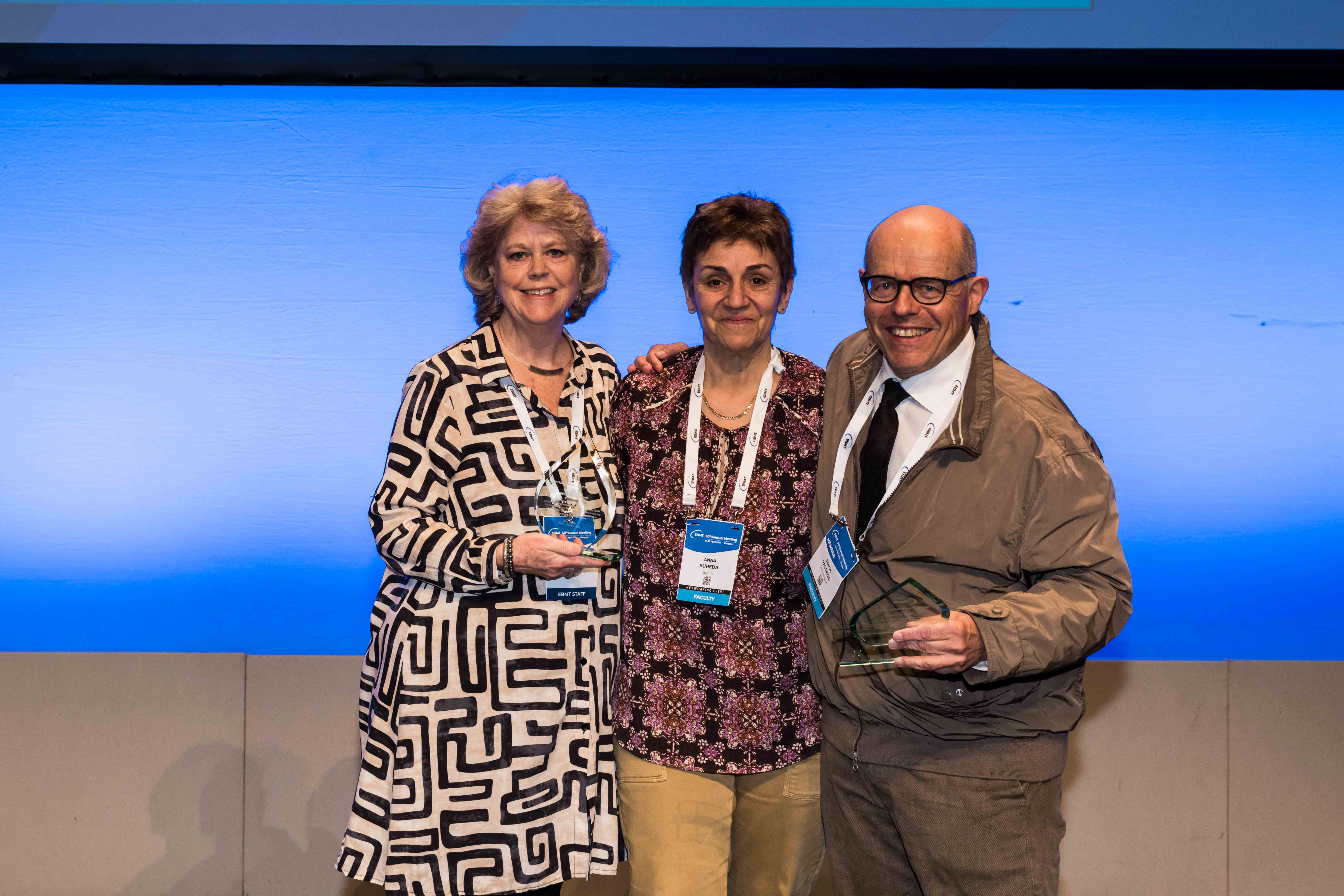 EBMT 2024 Distinguished Merit Award Helen Baldomero & Jakob Passweg