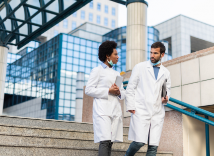 Doctors in front of a medical centre